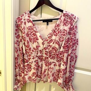 Very delicate, very pretty WHBM blouse.  Did  not try on prior to purchase.
